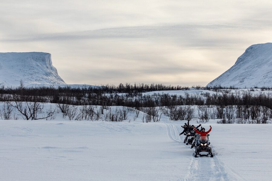 Abisko: Great Outback Snowmobile Tour with Lake Abiskojaure - Getting fitted out before the four-hour ride