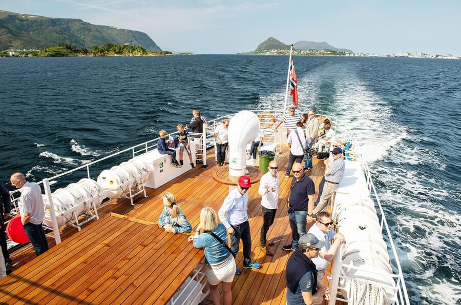 All About the Fjords, in one tour by boat & bus from Ålesund - Meeting the black and white MS Bruvik