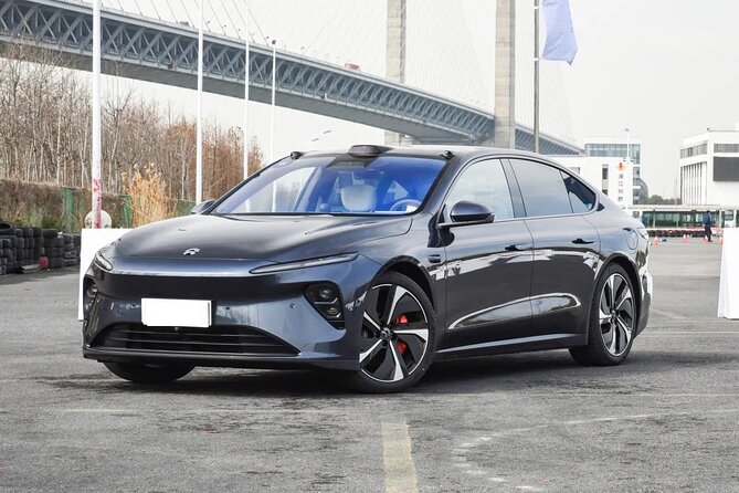 Arrival Private Transfer from Bergen Cruise Port to Bergen City by Sedan - A short ride in a Nio E7 sedan