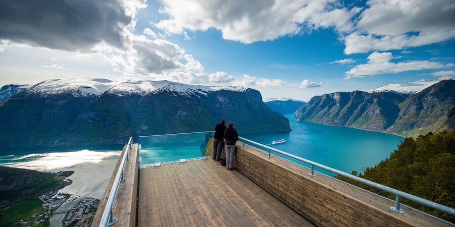 Bergen: Nærøyfjorden, Flåm, and Stegastein Guided Bus Tour - Tvindefossen gives the day an early rush