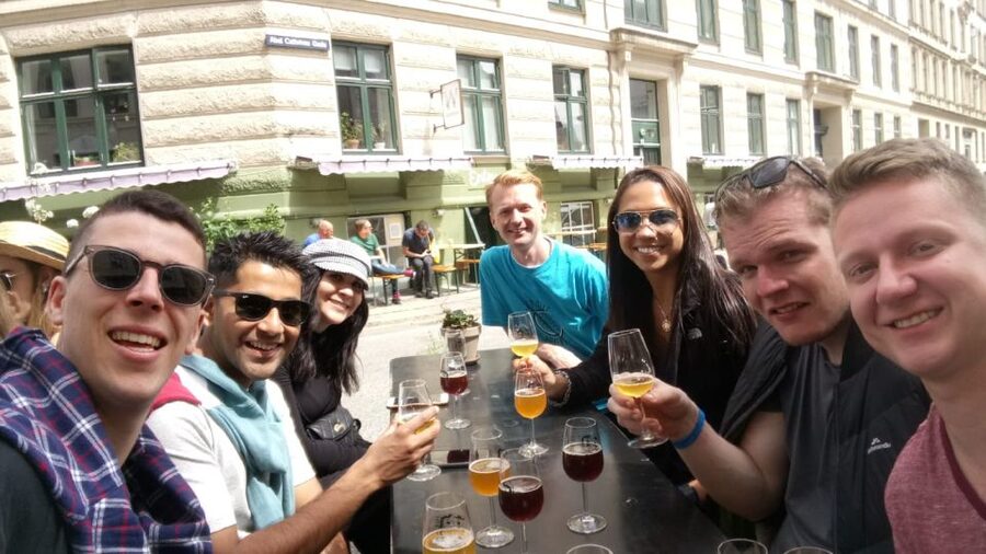 Copenhagen: 3-Hour Culinary Bike Tour - A market stop brings fish cake, rye, and Danish beer