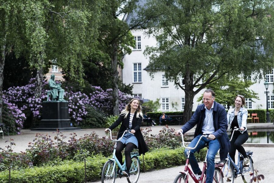 Copenhagen: City Highlights Guided Bike Tour - Nyhavn, colorful streets, and photo stops