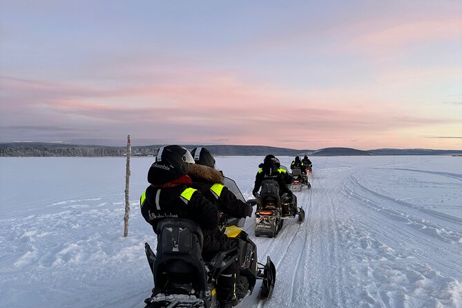 Day tour with snowmobile in Kiruna 10:30 am - Swedish fika beside the snowmobile route