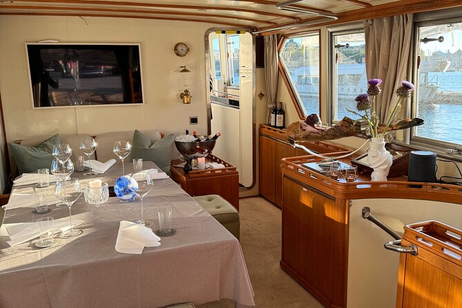 Exclusive Yacht Tour of Stockholm: sunset, dinner, lunch, cruise - Fjäderholmarna passes by without a shore visit
