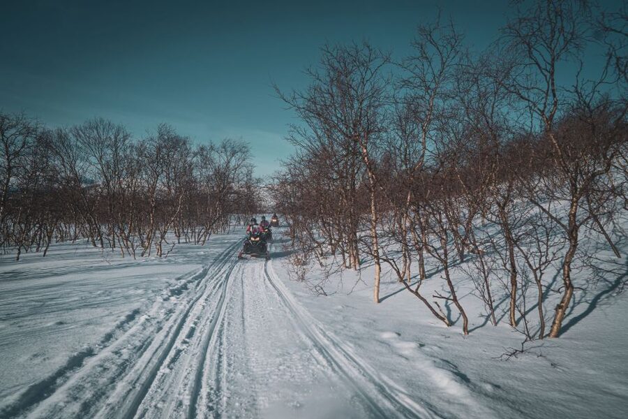 From Alta: Daytime Snowmobile Adventure - Following the old postal road toward Beskades