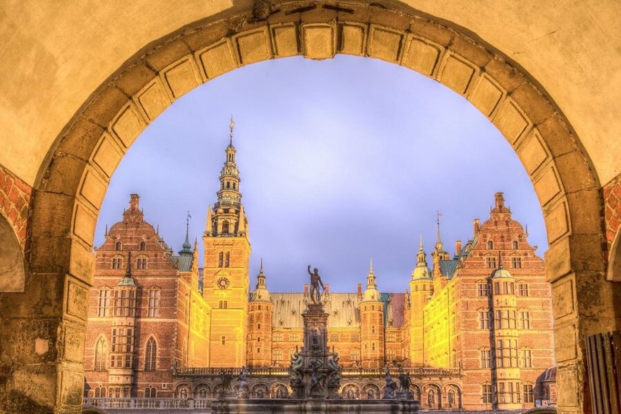 From Copenhagen: Private Frederiksborg Castle Tour - The castle lake and approach to the palace