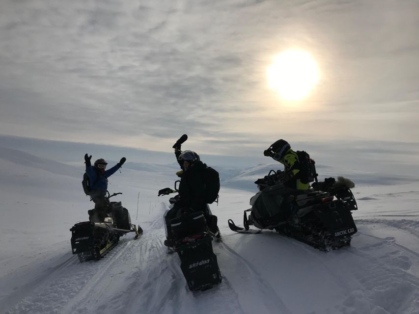 From Tromso: Arctic Wilderness Snowmobile Daytime Tour - Riding through the white valleys