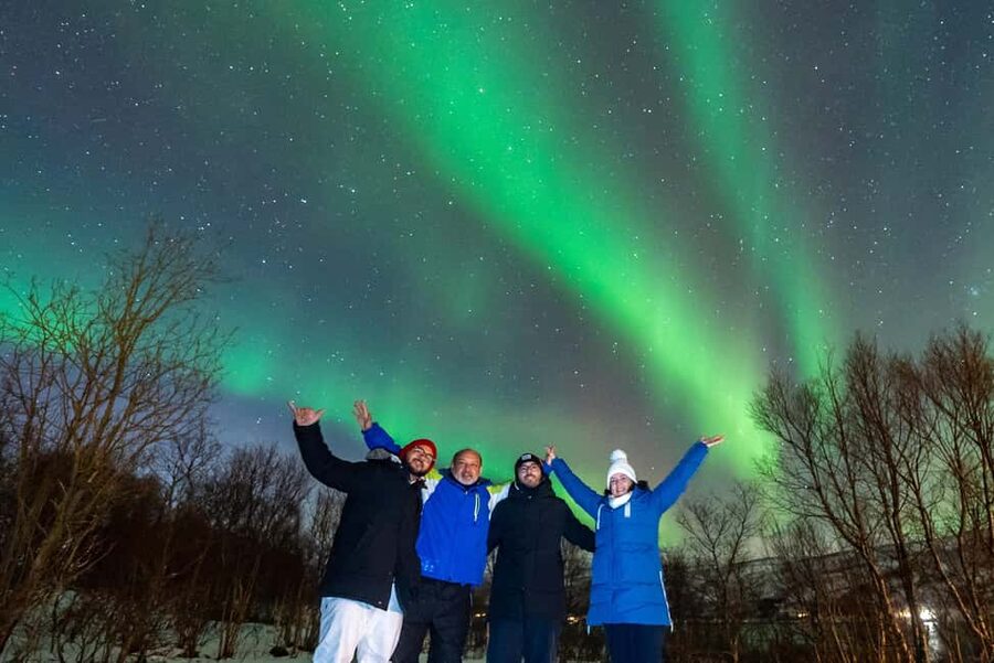 From Tromsø: Aurora Minibus Chase with Portrait and Hot Meal - A minibus built for waiting