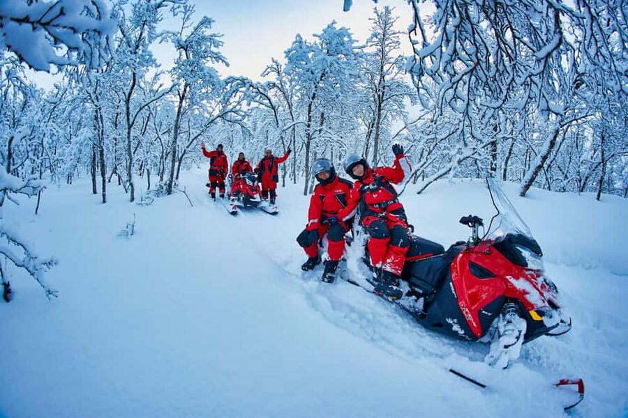 From Tromsø: Lyngen Alps Guided Snowmobile Tour - Fish soup and a warm basecamp finish