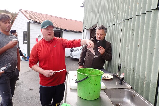 Half Day Fishing and Outdoor Cooking in Bergen - Cooking the catch in a historic sea house