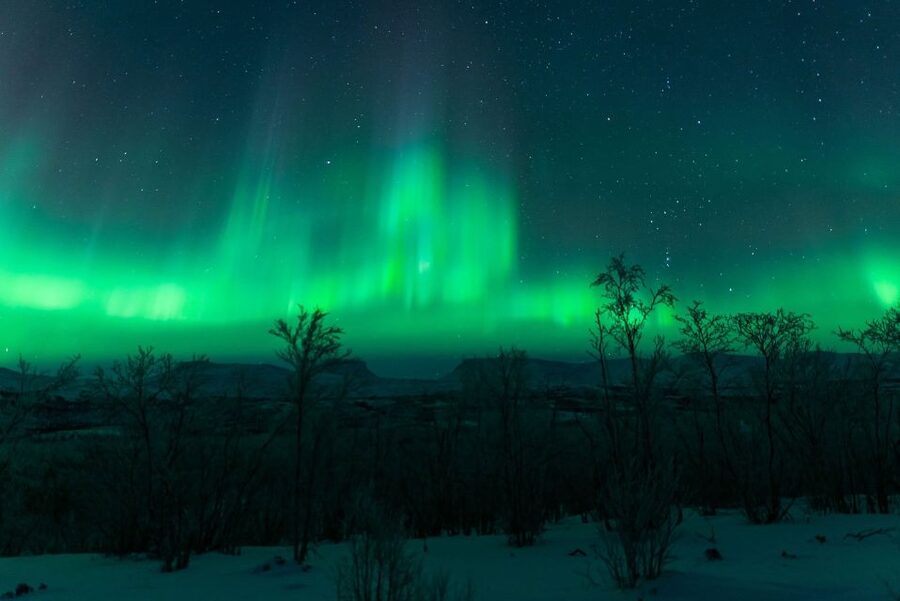 Kiruna: Northern Lights Tour with Photos - Chasing clear skies around Abisko, Finland, and Norway