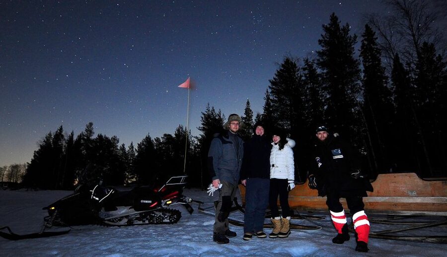 Luleå : Northern Lights Tour on a Snowmobile drawn Sled - Riding across the frozen sea