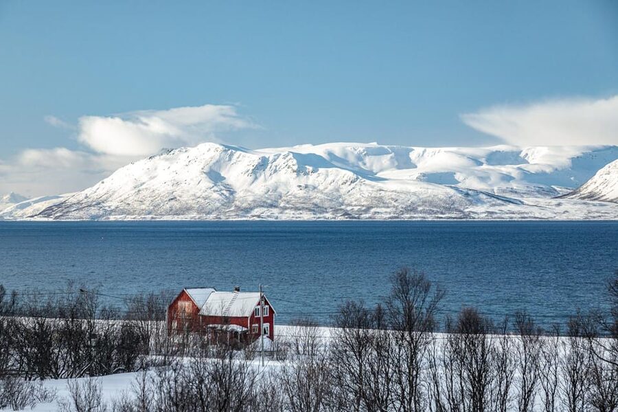 Lyngen: Snowmobile Safari with Lunch in seaside Restaurant - Suiting up for the snowmobile ride