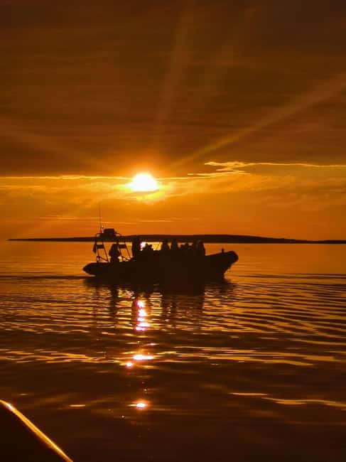 Midnight sun safari - Pulling into the RIB and preparing for the water