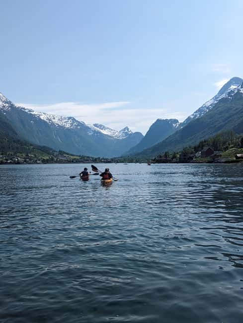 Olden: Guided beginner friendly fjord kayaking.Local company - Getting ready in drysuits and wet shoes