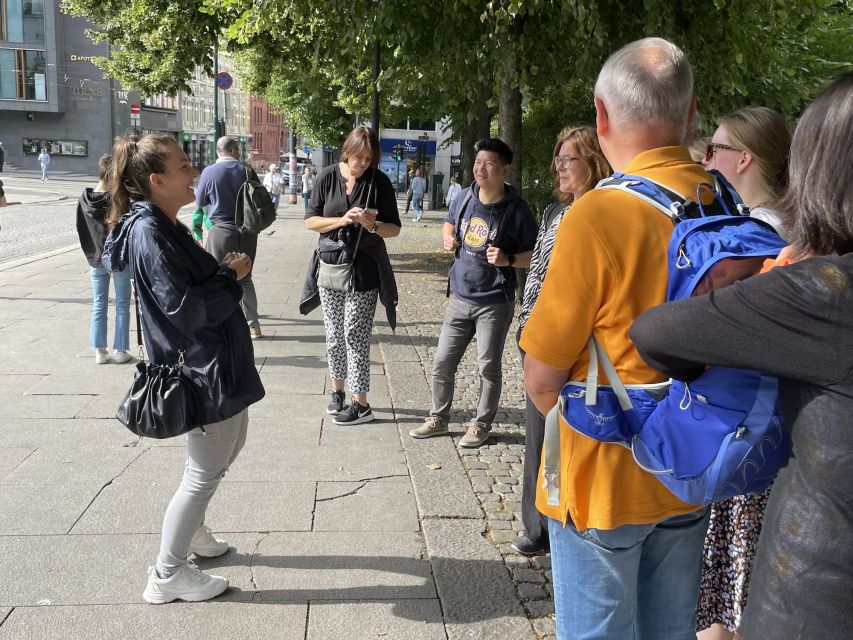 Oslo: Best of Oslo Walking Tour & Fjords Sightseeing Cruise - Karl Johan, Parliament, and the Grand Hotel