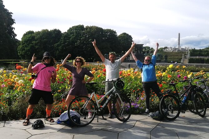 Oslo Highlights Bike Tour - City Hall and Karl Johans gate set the scene