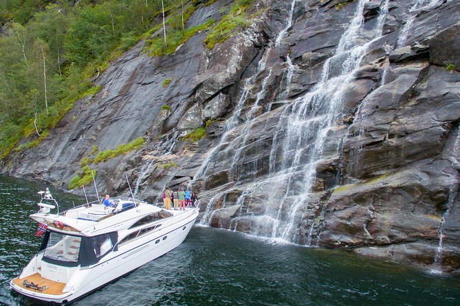 Private Fjord and waterfalls cruise to Modal- Mostraumen - Leaving Bergen beneath Bryggen