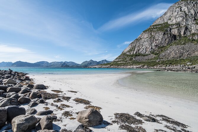 Private Full Day Sightseeing Tour from Svolvær to Å - Sakrisøy pairs yellow cabins with local food
