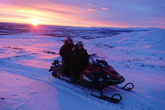Snowmobile Safari to Lapland viewpoint - Arctic clothing makes the morning easier