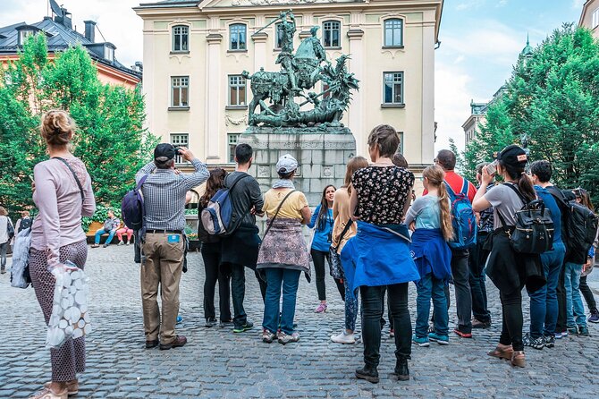 Stockholm Old Town Private Walking Tour - Tiny statues and a giant medieval symbol