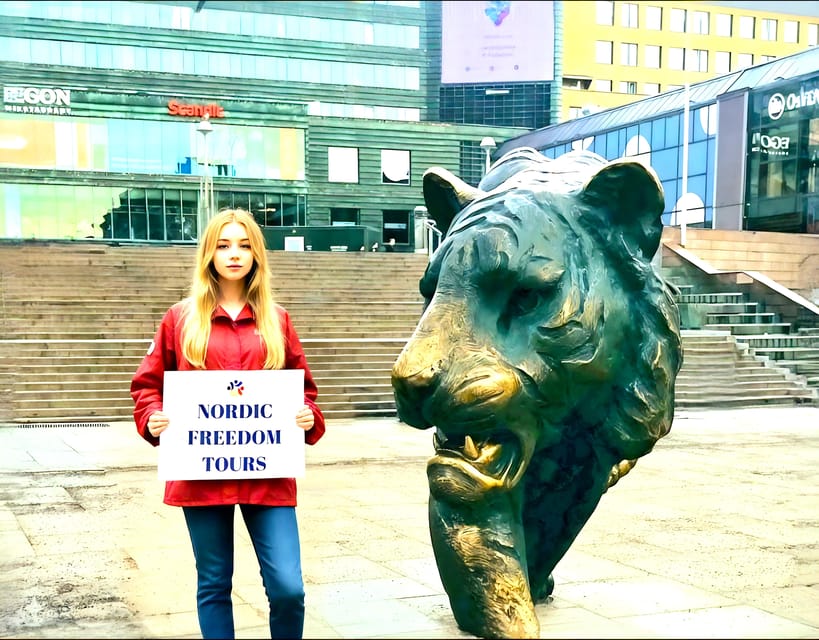 Tour a Pie en Oslo en Español - Starting with Oslo’s Tiger at Jernbanetorget