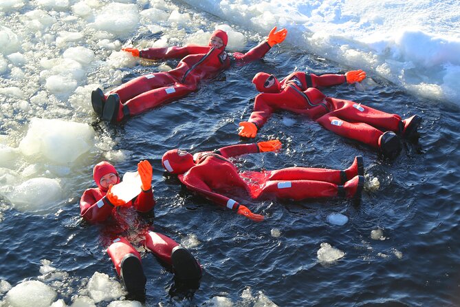 Tromso Arctic Fjord Floating - Getting into the suit at Eidkjosen