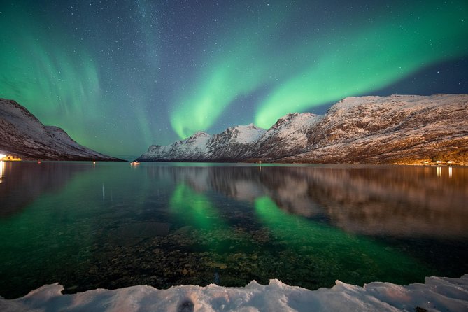Tromso Aurora Chase by Minibus with Thermal Suit, Snack and Photo - Leaving Tromsø for the Arctic night