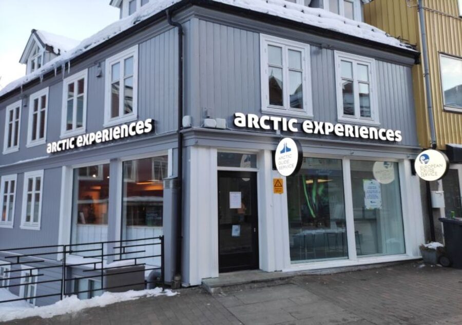 Tromso: City Highlights Guided Walking Tour - Walking the pier toward Tromsø’s older quarters