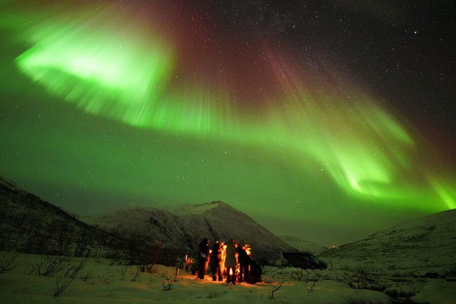 Tromsø: Northern Lights Tour with Free Professional Portrait - Chasing clear skies beyond Tromsø